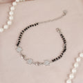 Delicate Silver Starburst Black Bead Bracelet
