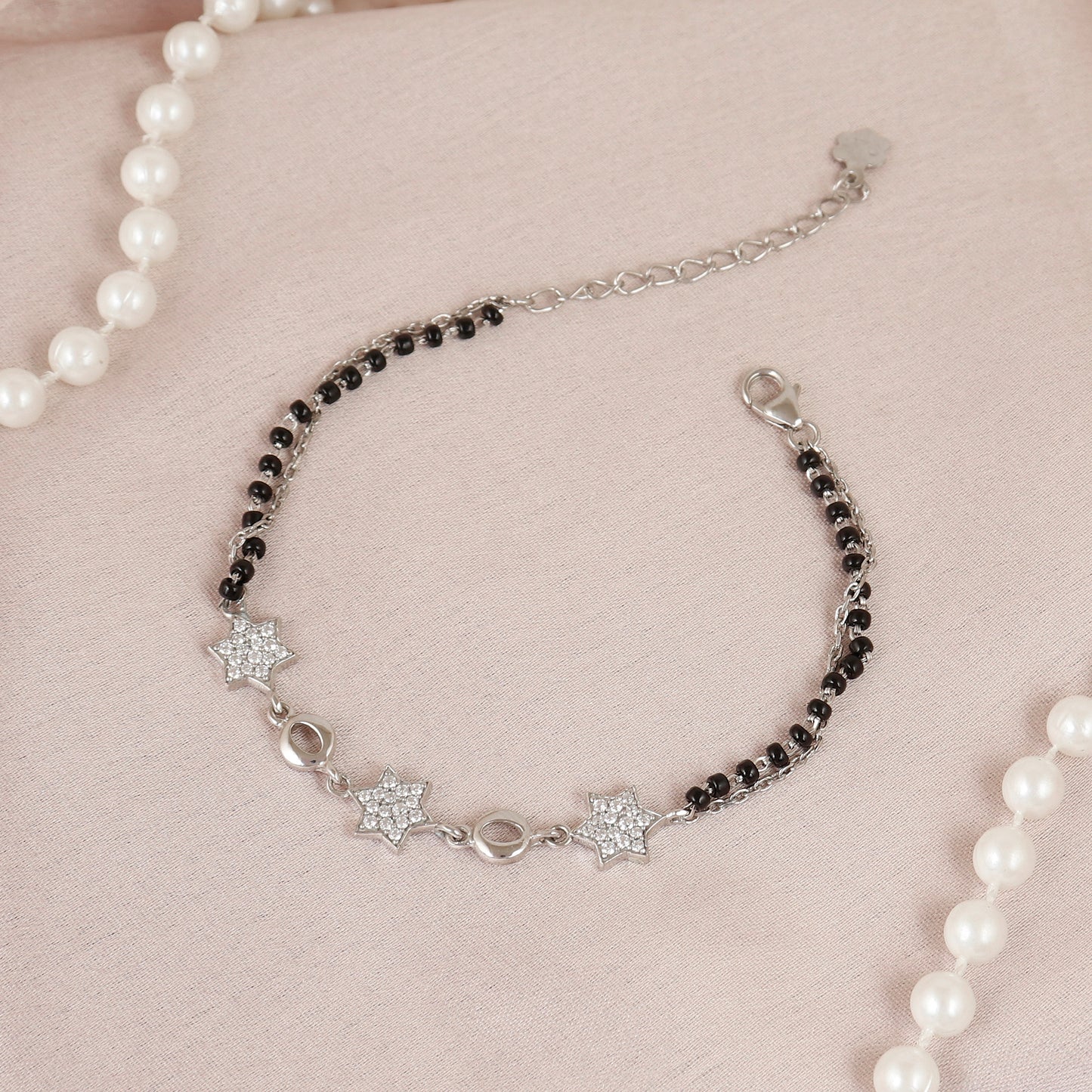 Delicate Silver Starburst Black Bead Bracelet