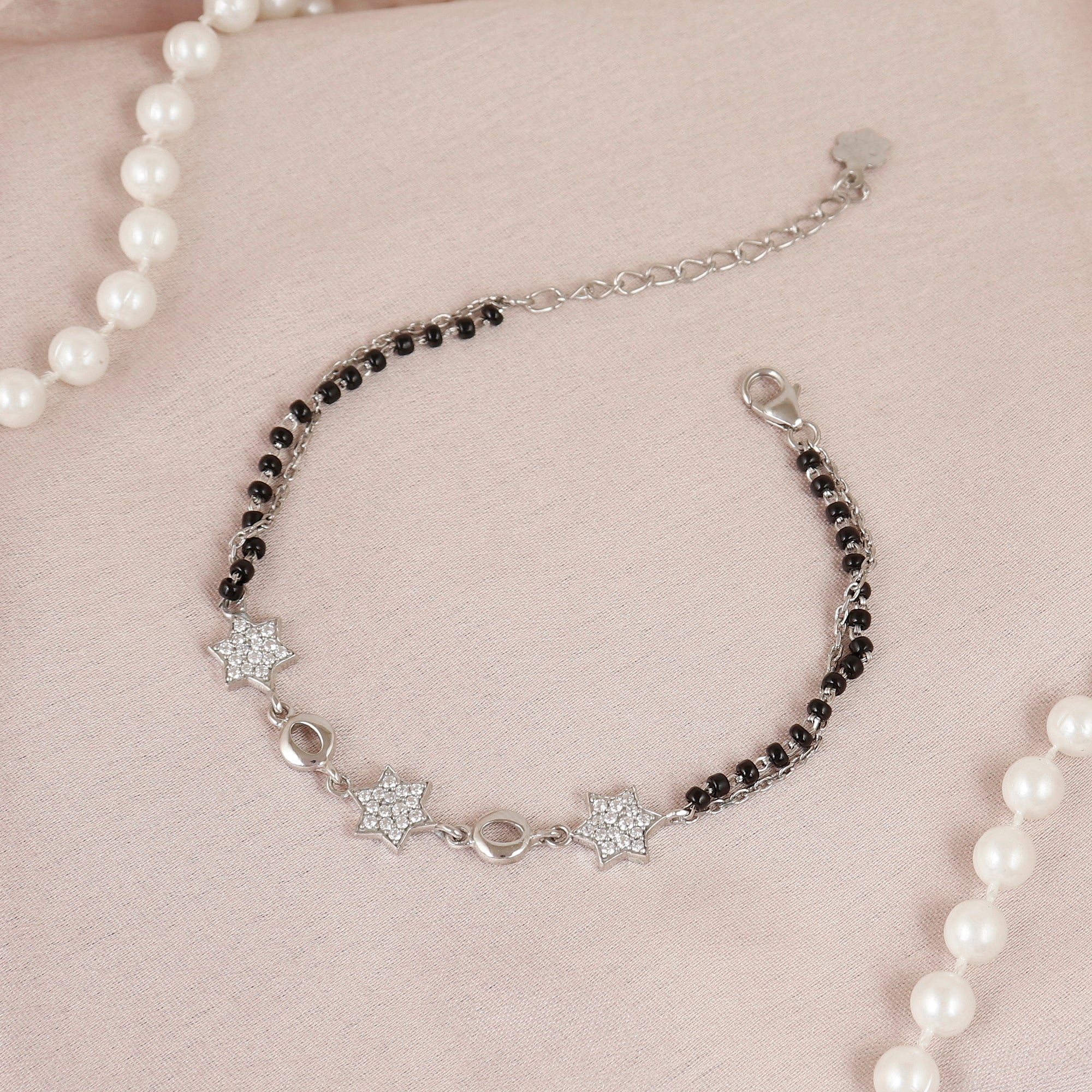 Delicate Silver Starburst Black Bead Bracelet